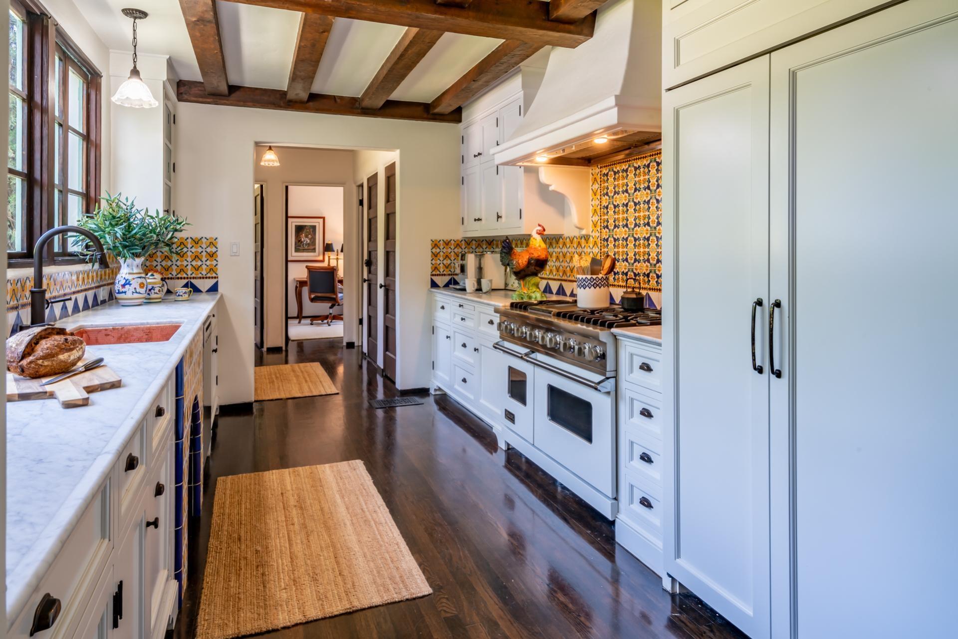 1098 Golf Road Montecito, CA 93108 - Photo 18 of 62 a kitchen with stainless steel appliances a stove a sink and a refrigerator