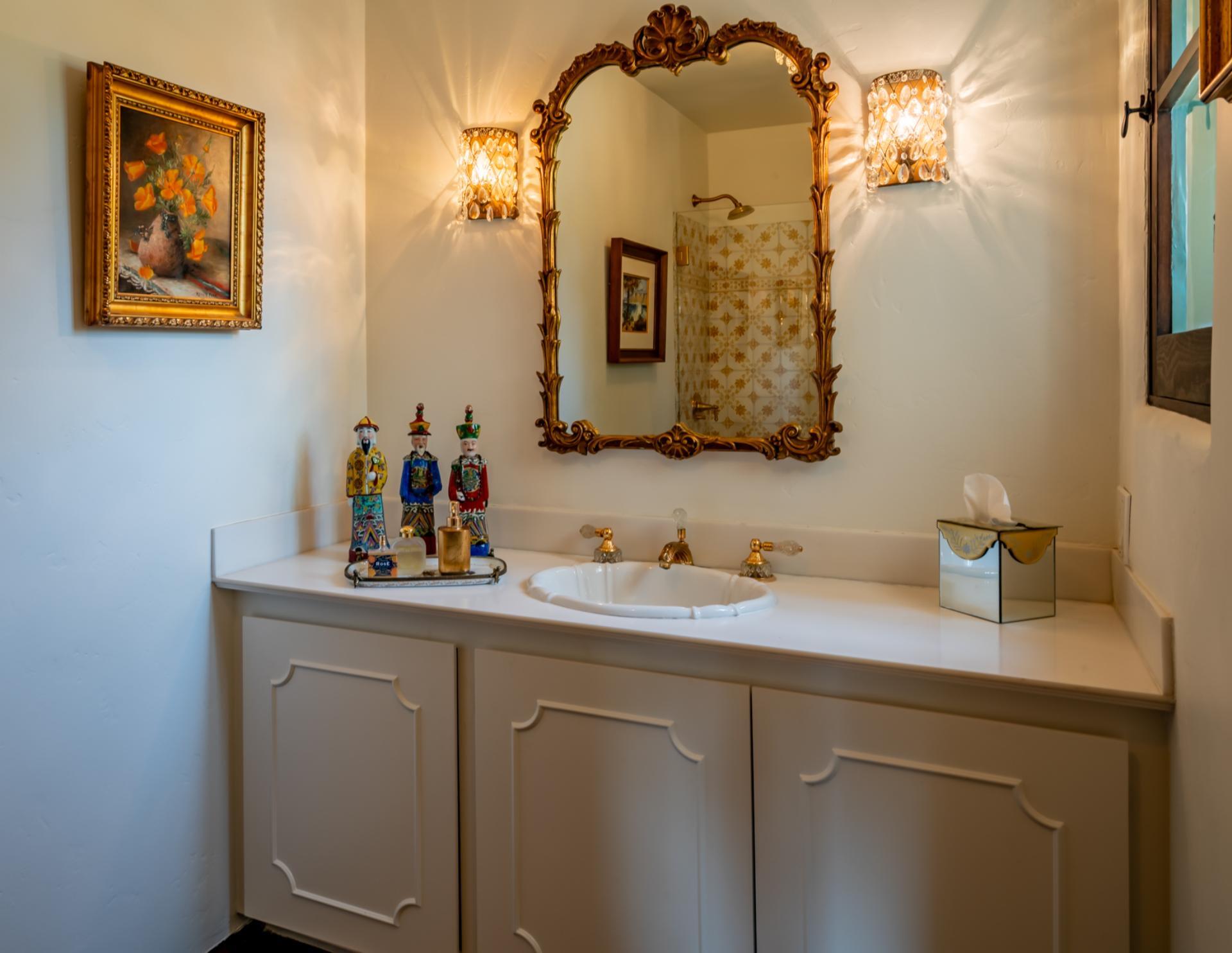 1098 Golf Road Montecito, CA 93108 - Photo 25 of 62 a bathroom with a sink and a mirror