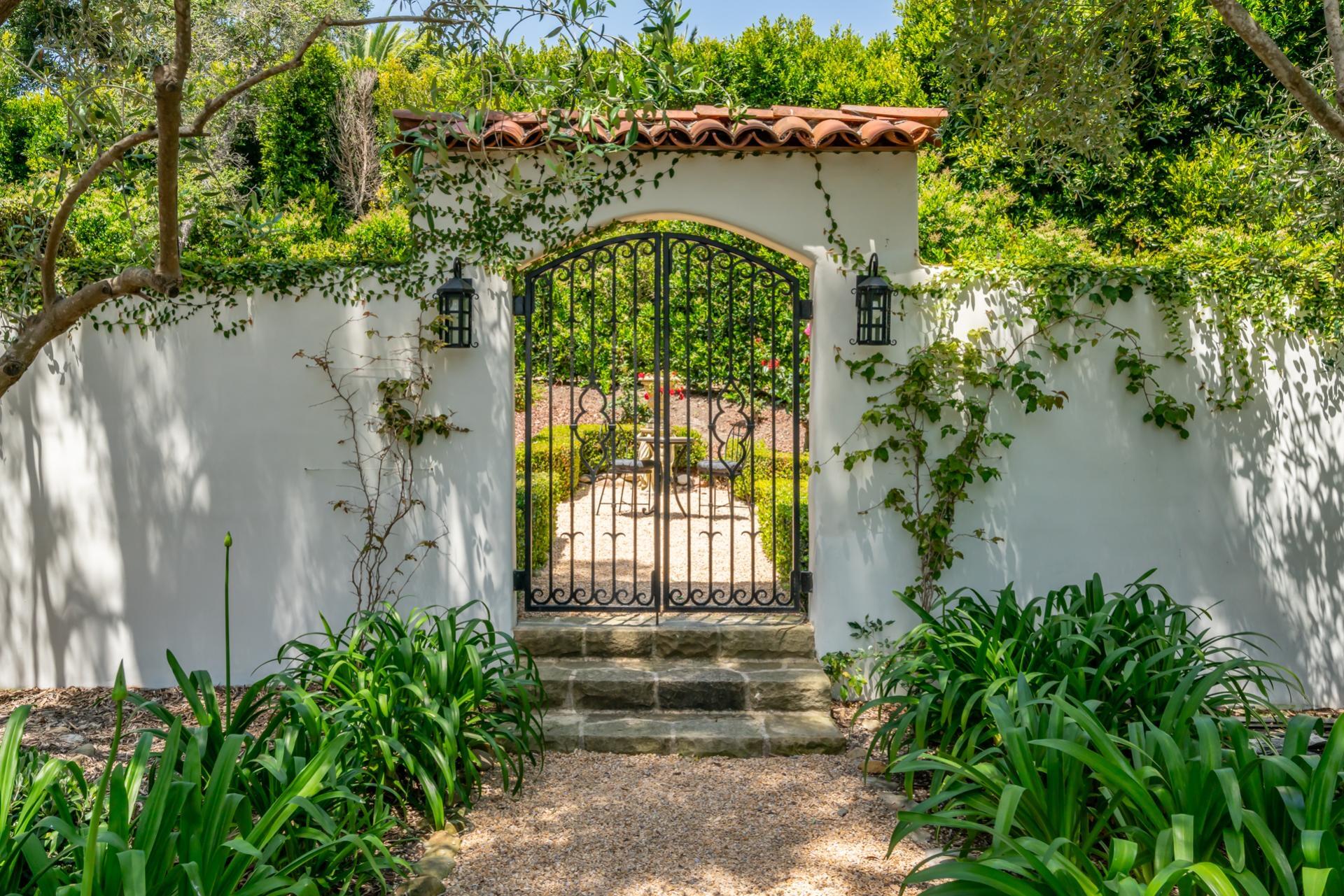 1098 Golf Road Montecito, CA 93108 - Photo 26 of 62 a front view of a house with a yard