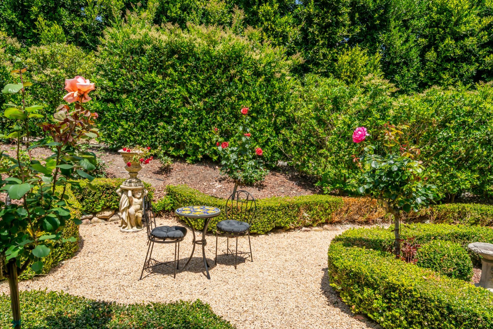 1098 Golf Road Montecito, CA 93108 - Photo 27 of 62 a backyard of a house with a yard and outdoor seating