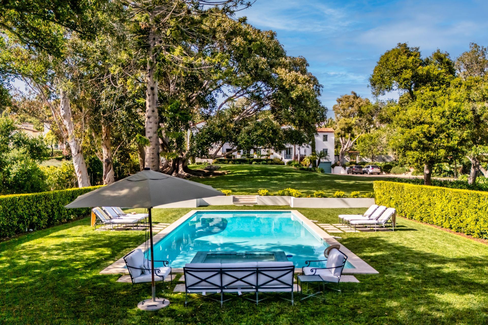 1098 Golf Road Montecito, CA 93108 - Photo 3 of 62 a view of a swimming pool with a patio and a garden