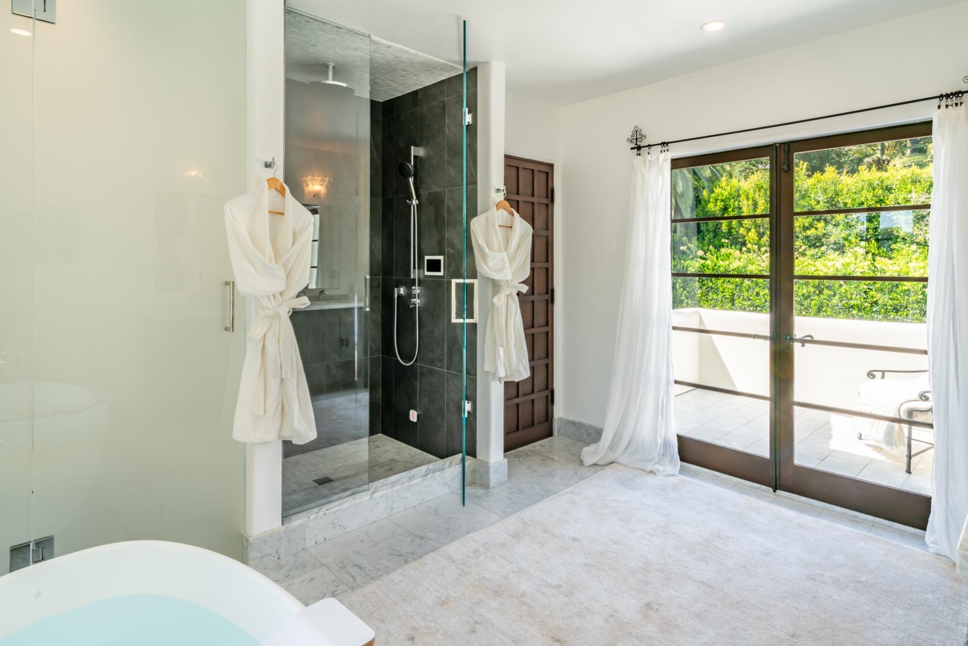 1098 Golf Road Montecito, CA 93108 - Photo 40 of 62 a bathroom with a sink toilet and shower