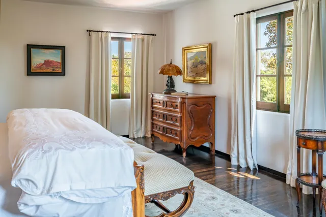 a front view of house and yard with green space