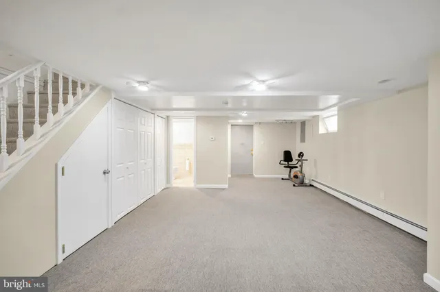 a view of a livingroom with a staircase