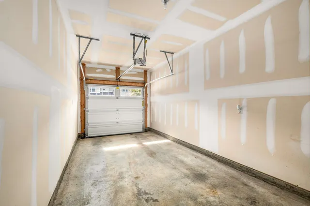 a view of a hallway with stairs