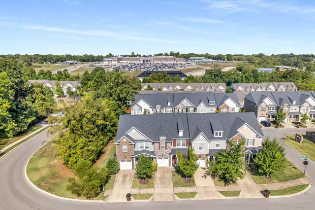 an aerial view of a house with a garden