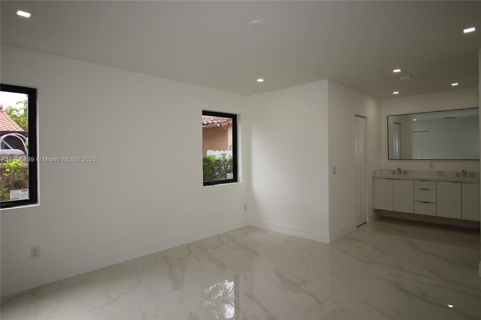 10810 Southwest 28th Street Miami, FL 33165 - Photo 29 of 45 a view of a hallway with closet