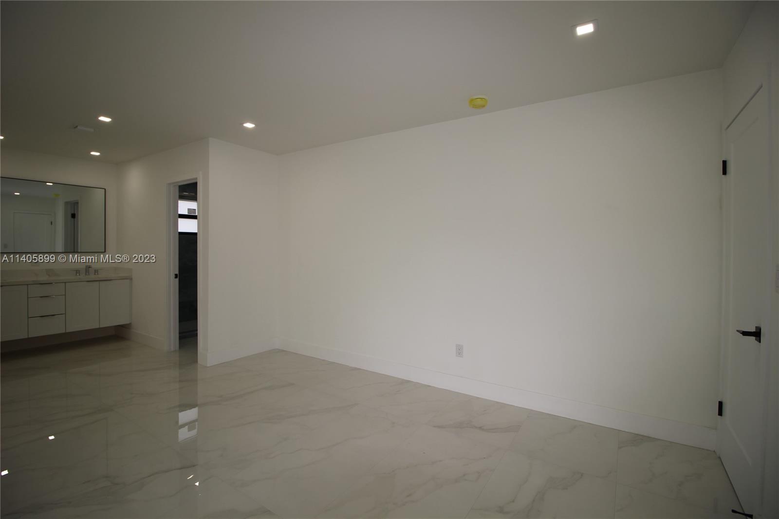 10810 Southwest 28th Street Miami, FL 33165 - Photo 30 of 45 a view of a kitchen with a sink