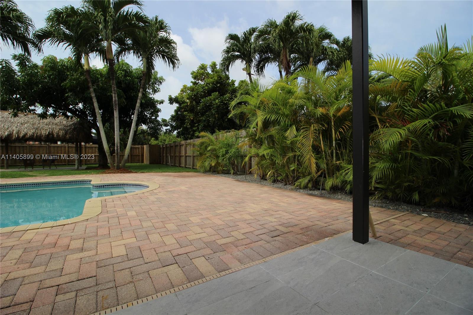 10810 Southwest 28th Street Miami, FL 33165 - Photo 10 of 45 a view of a yard and entertaining space