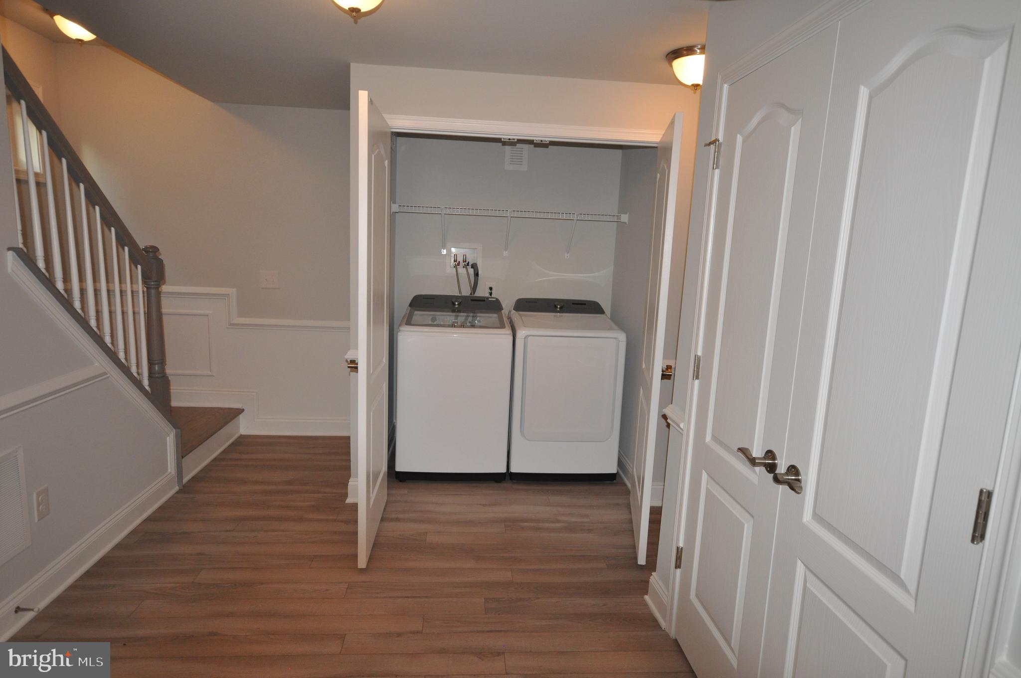 320 Heulings Avenue Riverside, NJ 08075 - Photo 22 of 28 Basement Laundry with Hide away Doors