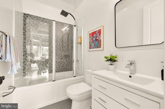 a view of roof deck with patio