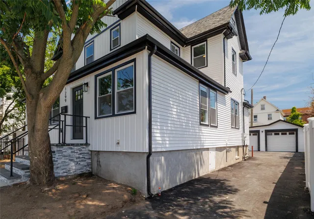 a view of a house with a street