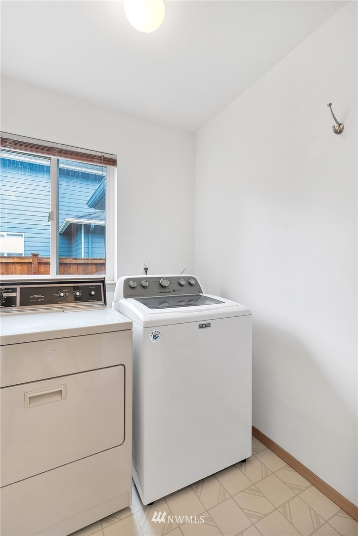706 203rd Street Southeast Bothell, WA 98012 - Photo 12 of 21 a utility room with dryer and washer