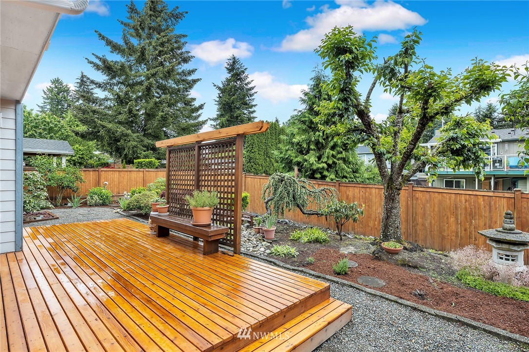 706 203rd Street Southeast Bothell, WA 98012 - Photo 19 of 21 a backyard of a house with seating space