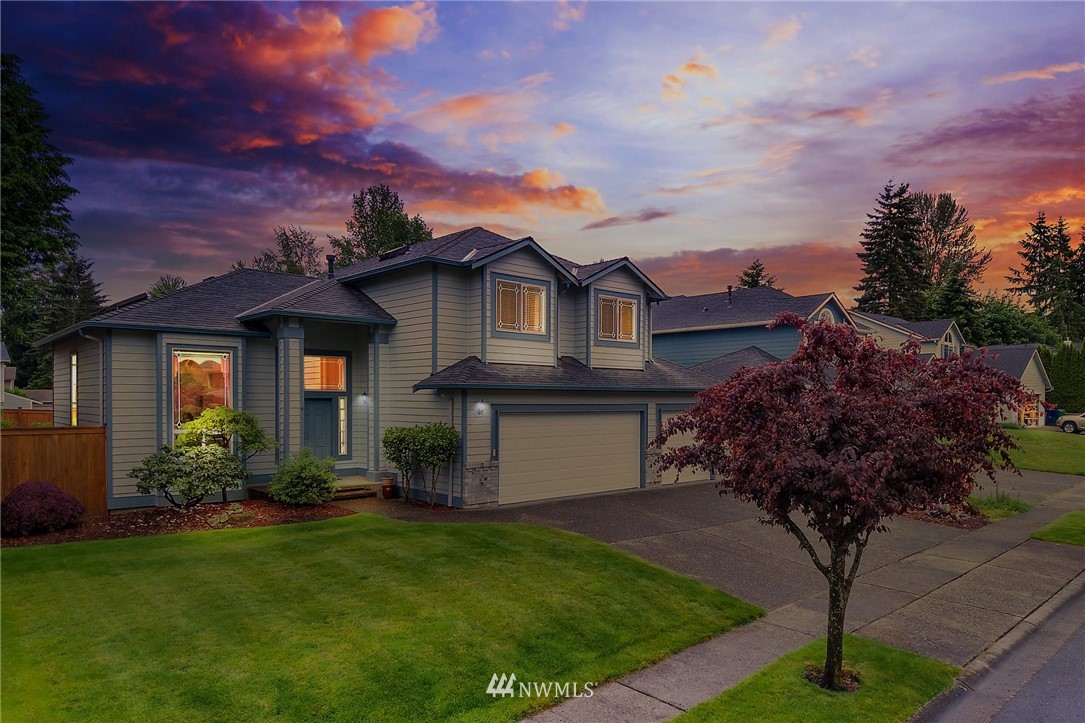 706 203rd Street Southeast Bothell, WA 98012 - Photo 21 of 21 a front view of a house with garden