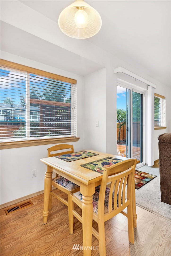 706 203rd Street Southeast Bothell, WA 98012 - Photo 6 of 21 a dining room with a table and chairs