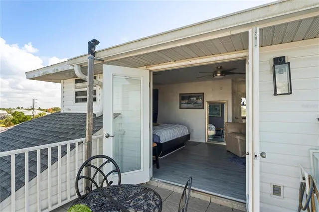 a front view of a house with a garden and yard