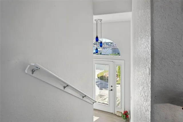a living room with fireplace furniture and a wooden floor