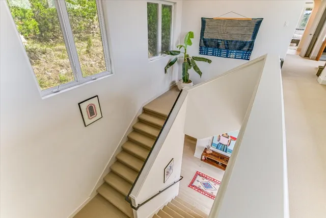 a view of living room with furniture and window