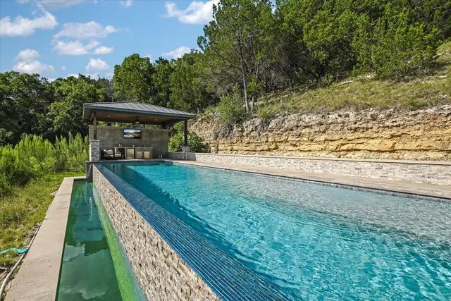 a view of a yard with an outdoor space