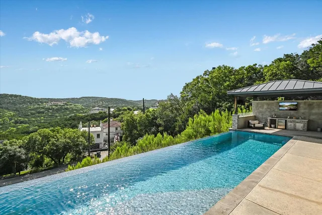 a view of a garden with a patio