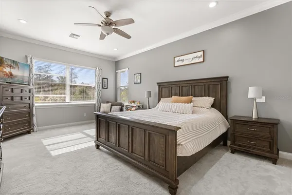 a bed room with a bed and a window