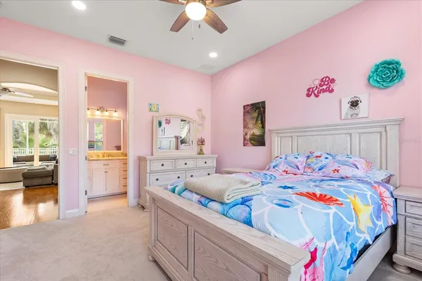 a bedroom with bed and window