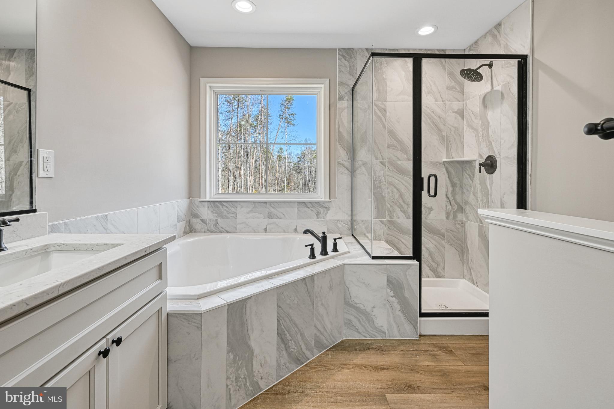 48 Pine Drive Louisa, VA 23093 - Photo 27 of 76 a bathroom with a bathtub and a sink