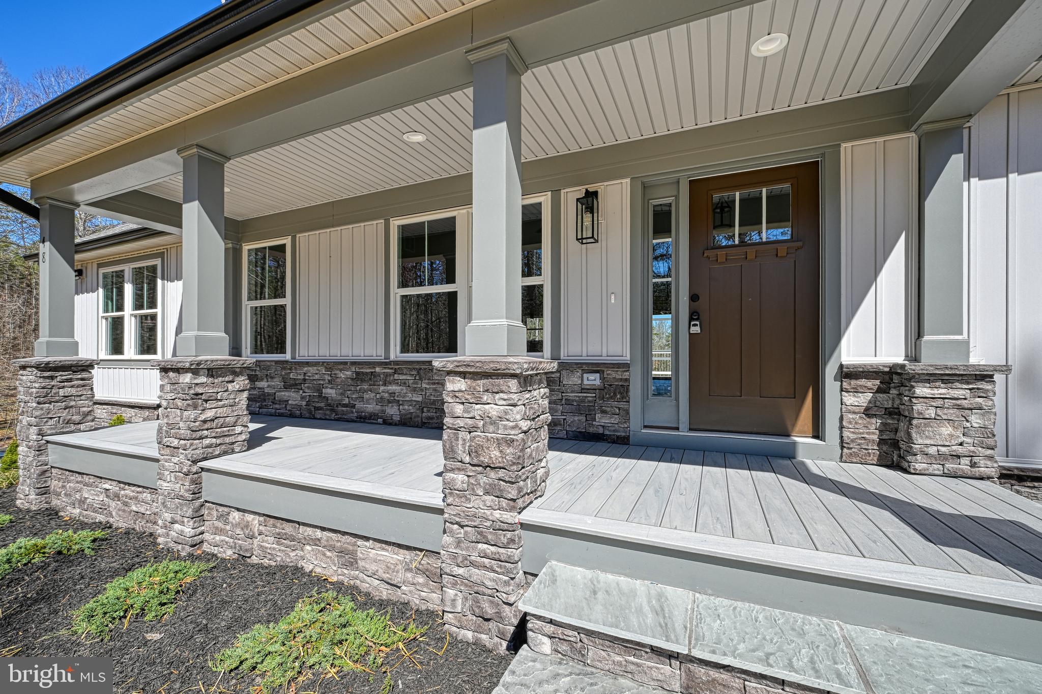48 Pine Drive Louisa, VA 23093 - Photo 64 of 76 a view of front door of house with stairs