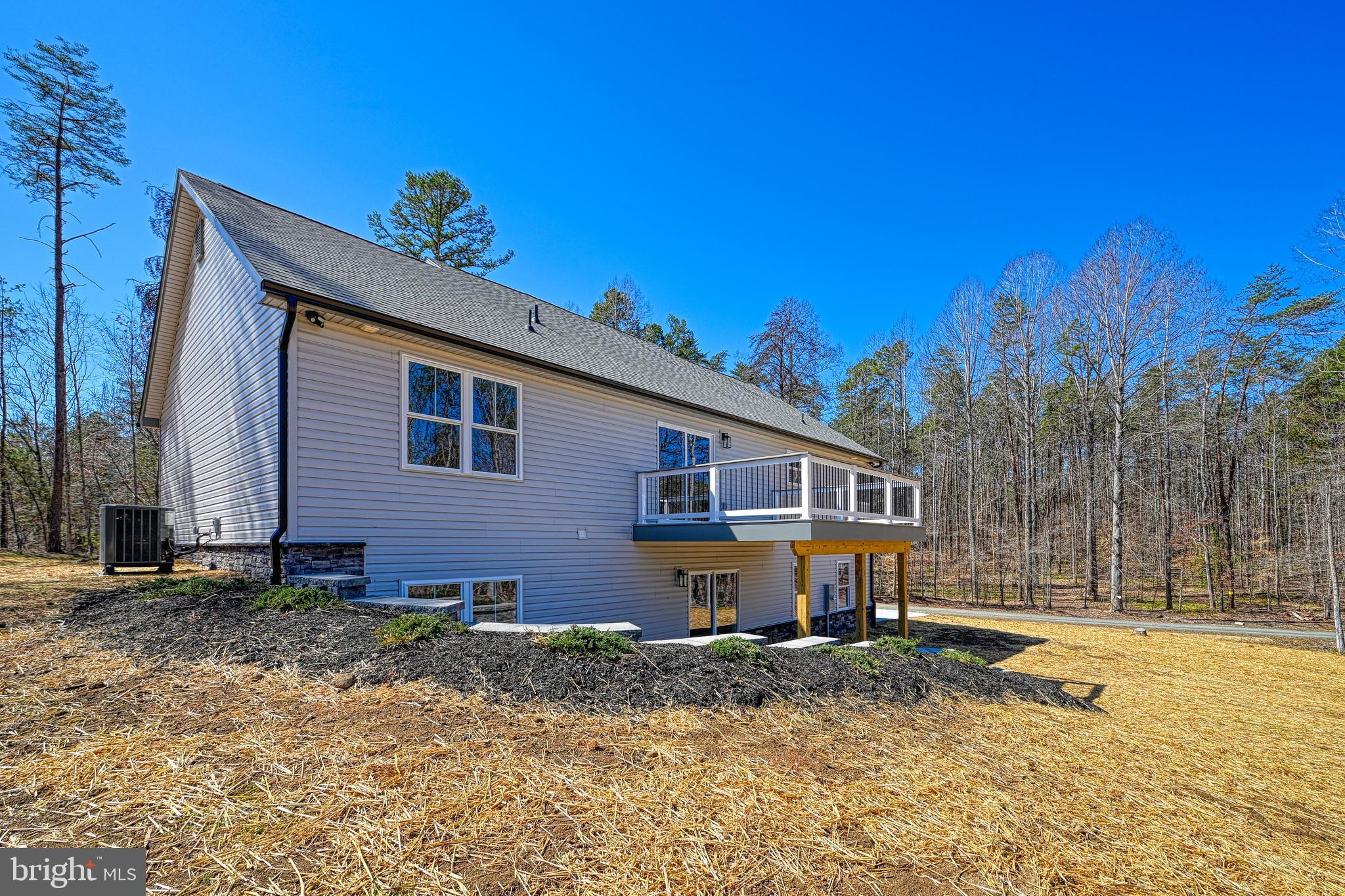 48 Pine Drive Louisa, VA 23093 - Photo 70 of 76 a view of a house with a yard
