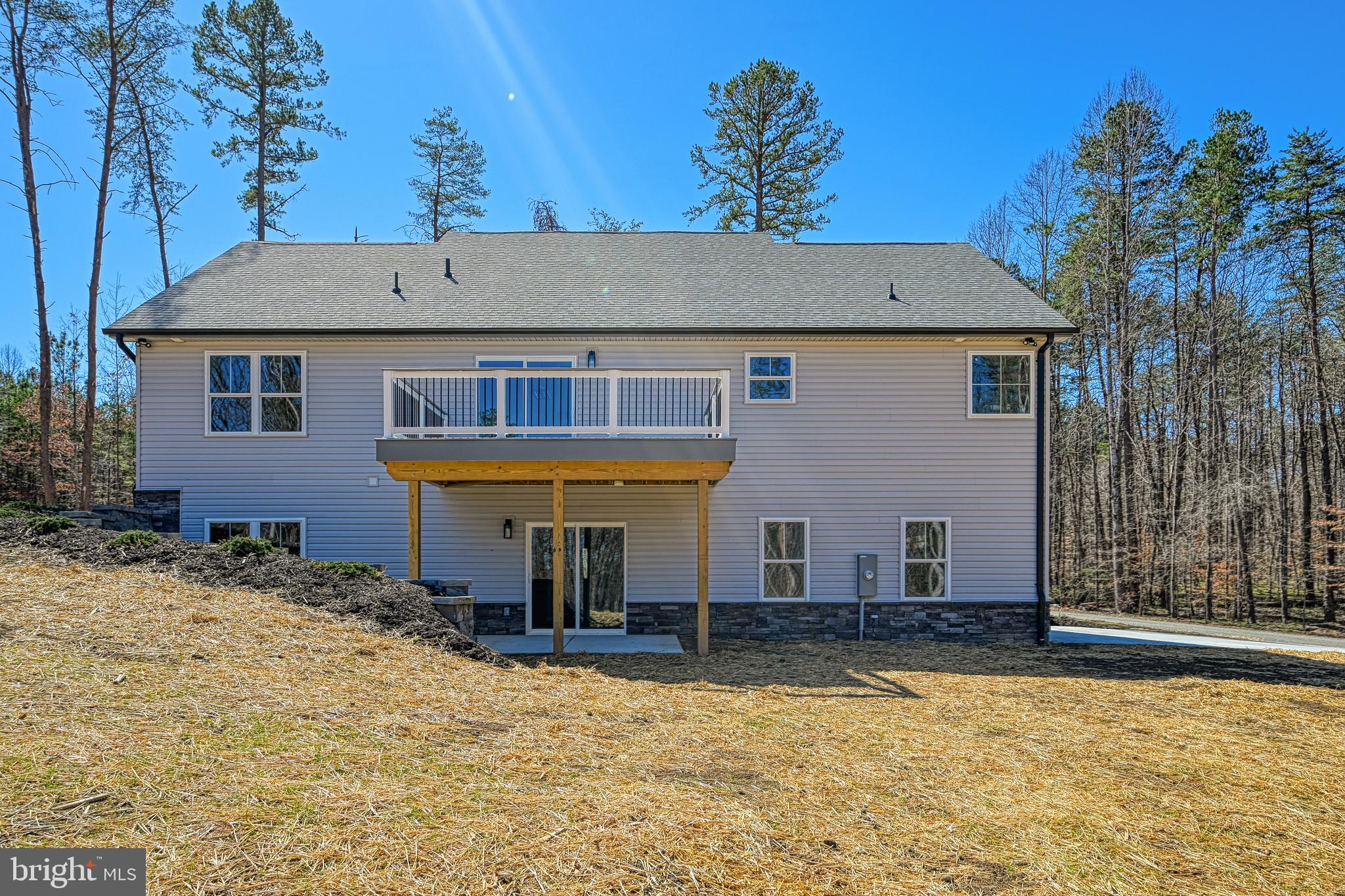 48 Pine Drive Louisa, VA 23093 - Photo 72 of 76 a view of a house with a yard