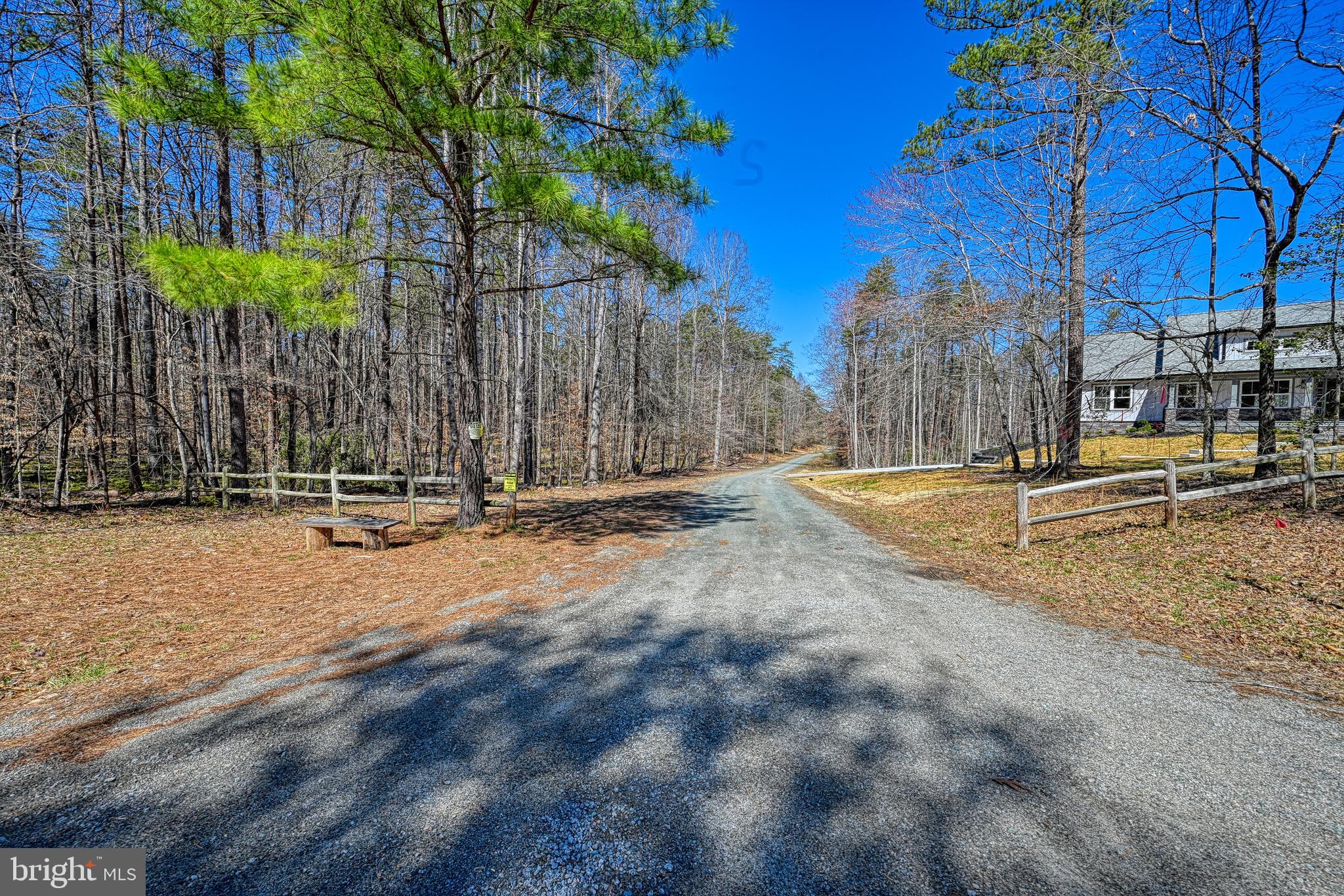 48 Pine Drive Louisa, VA 23093 - Photo 76 of 76 a backyard of a house with table and chairs