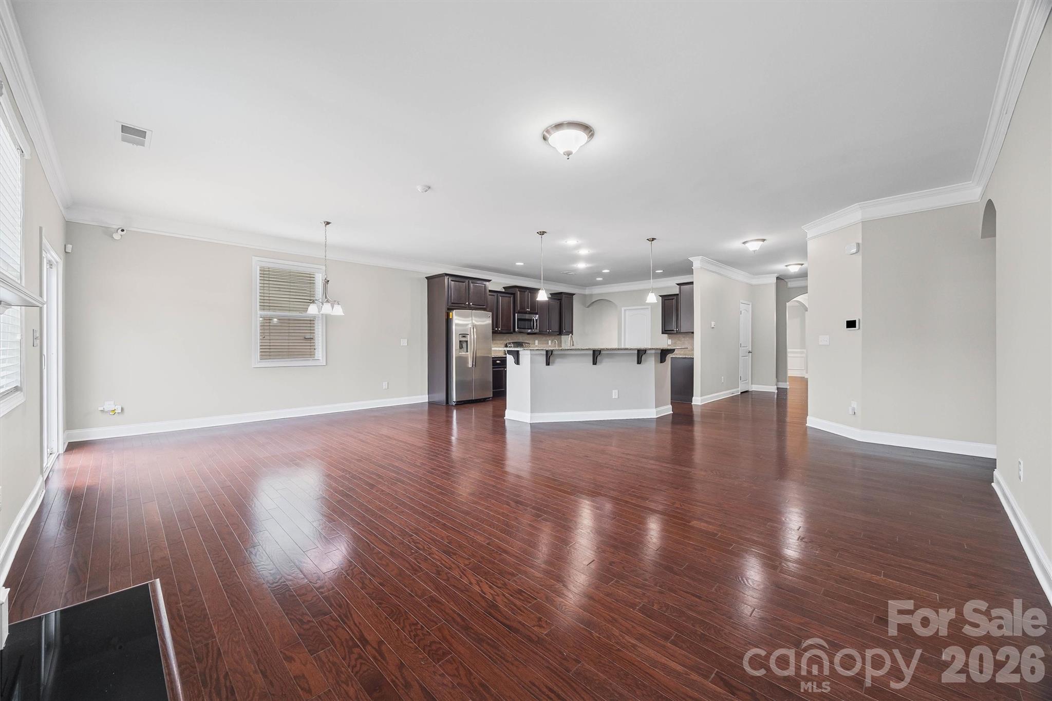 1129 Black Walnut Road Clover, SC 29710 - Photo 19 of 40 a view of kitchen and dining room with wooden floor