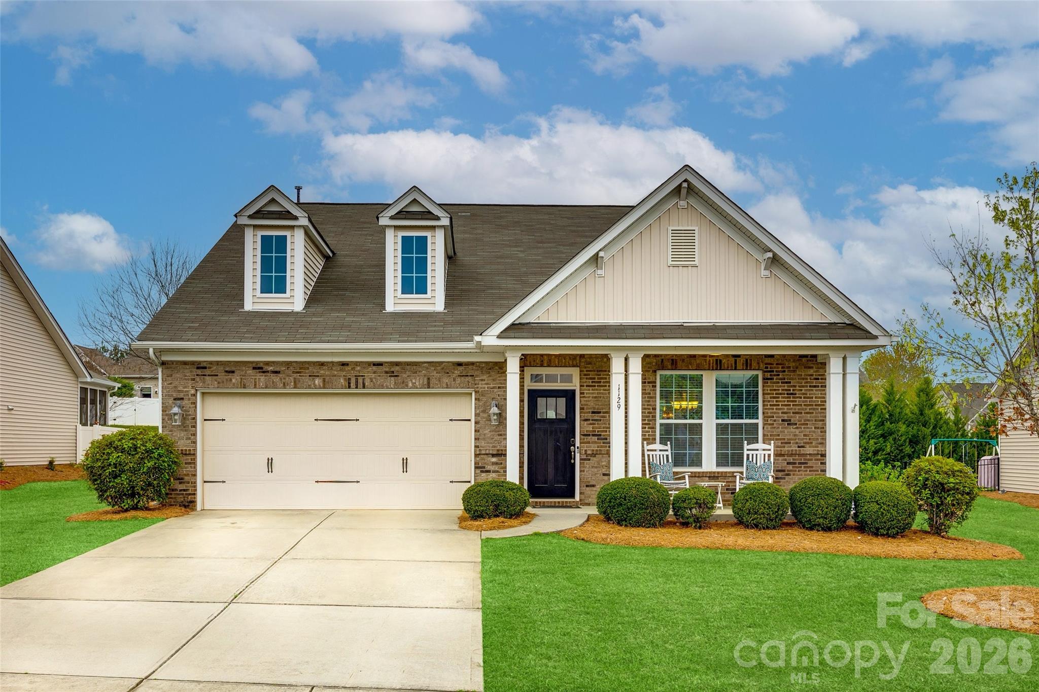 1129 Black Walnut Road Clover, SC 29710 - Photo 2 of 40 a front view of a house with a yard
