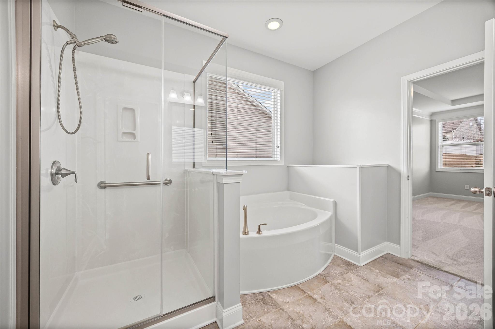 1129 Black Walnut Road Clover, SC 29710 - Photo 28 of 40 a bathroom with a bathtub and shower