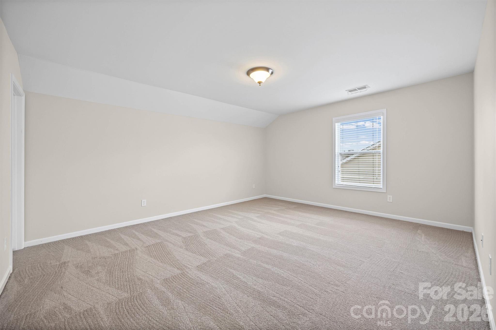 1129 Black Walnut Road Clover, SC 29710 - Photo 32 of 40 an empty room with a window