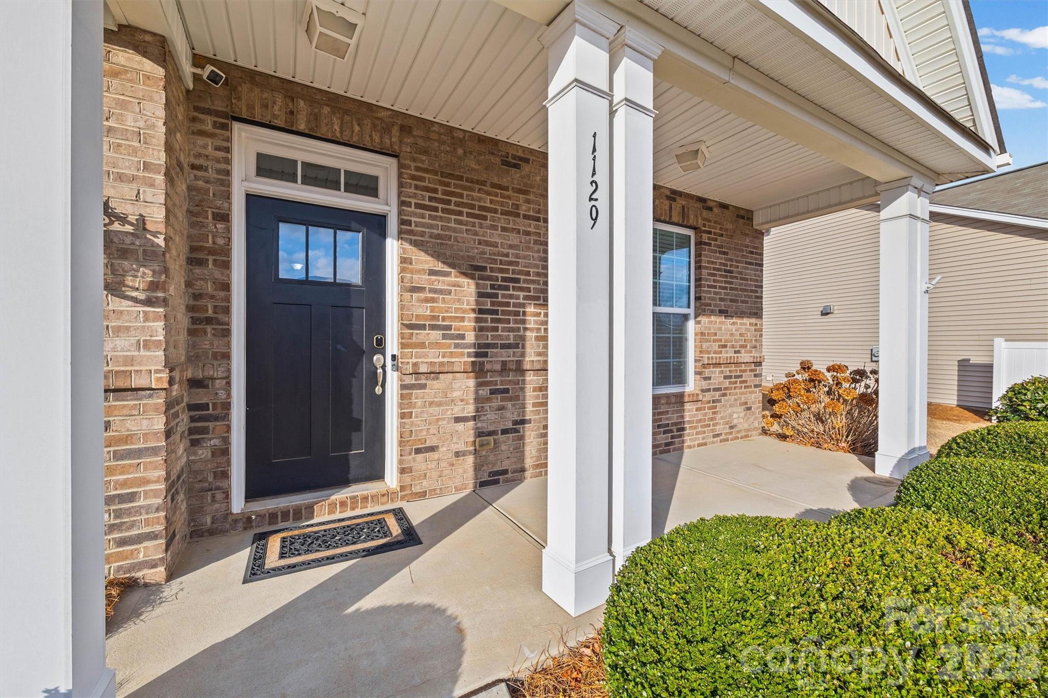 1129 Black Walnut Road Clover, SC 29710 - Photo 5 of 40 a view of a house with a door and wooden floor