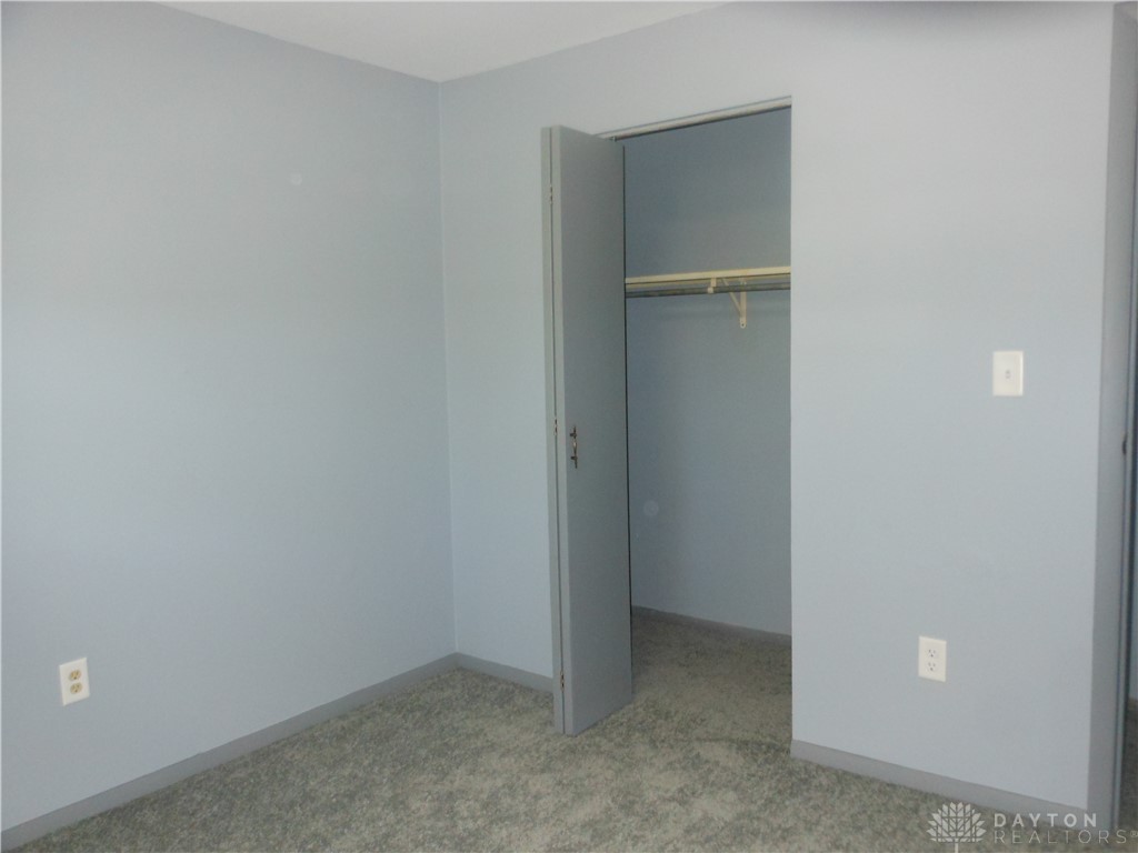 143 West Emerick Road West Milton, OH 45383 - Photo 21 of 37 A well-maintained bedroom offers comfort and a generous closet space.