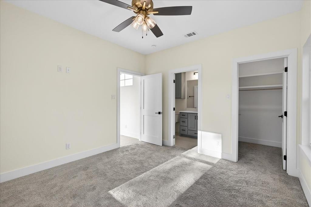 114 Castlewood Road Enchanted Oaks, TX 75156 - Photo 25 of 33 a view of a livingroom with a ceiling fan & entryway