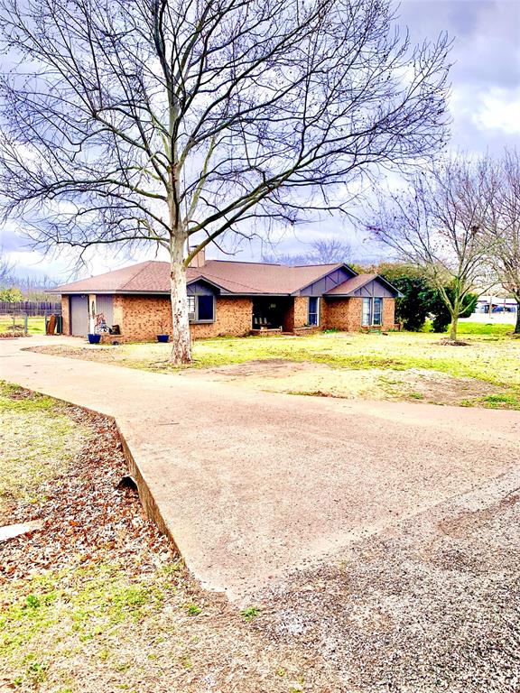 102 Mabry Lane Red Oak, TX 75154 - Photo 1 of 1 a view of a swimming pool and trees in the background