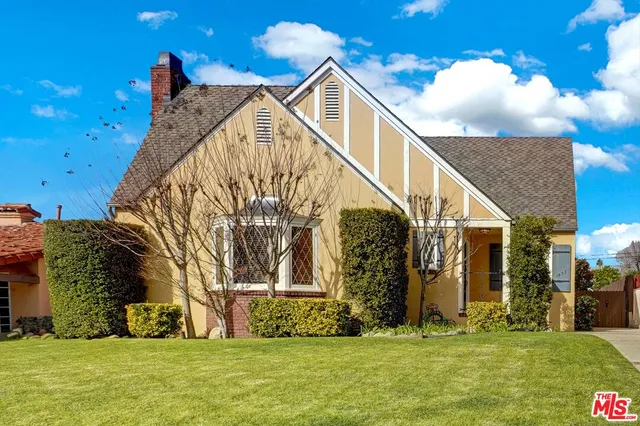 a view of swimming pool with a yard