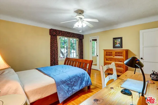 a bathroom with a sink and a large mirror