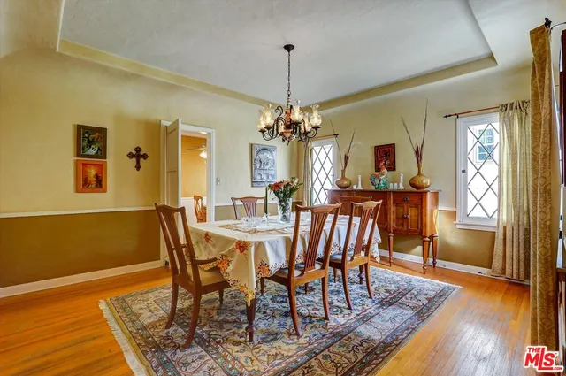 a kitchen with a stove a sink and a refrigerator