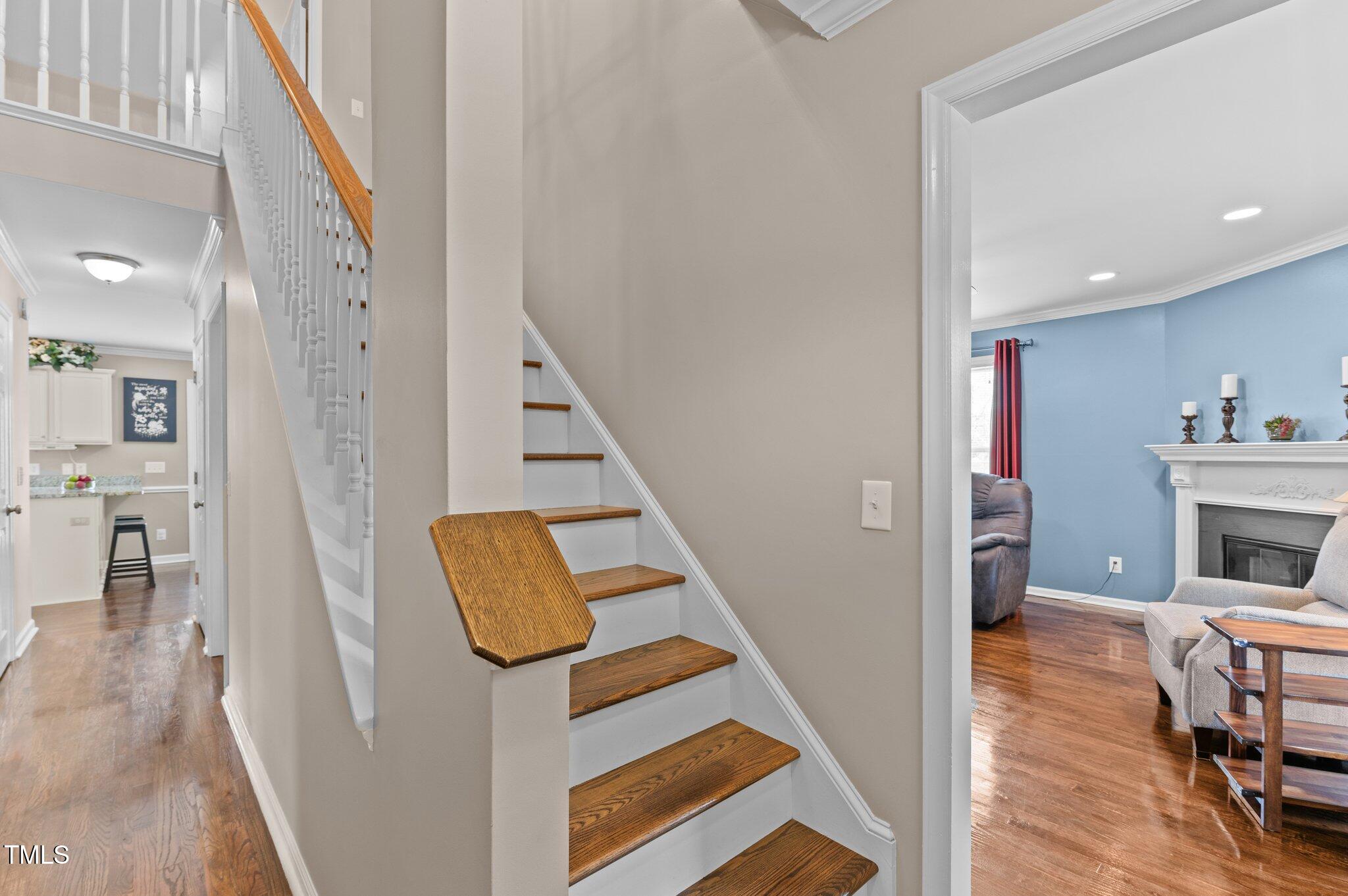 4810 Mitchell Mill Road Wake Forest, NC 27587 - Photo 19 of 35 a view of living room with furniture and wooden floor