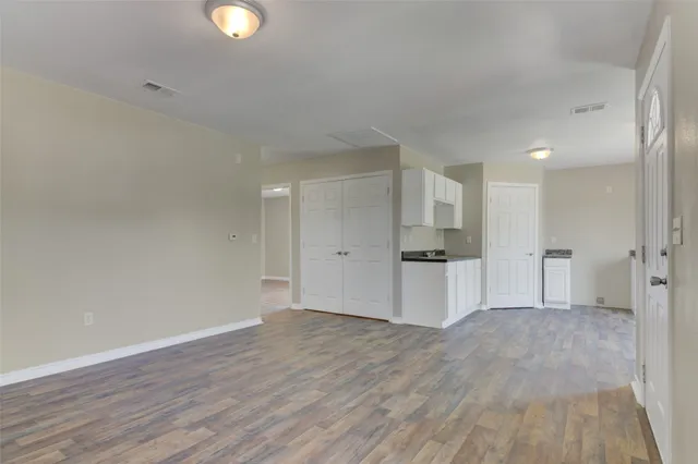 a kitchen that has a sink and a stove