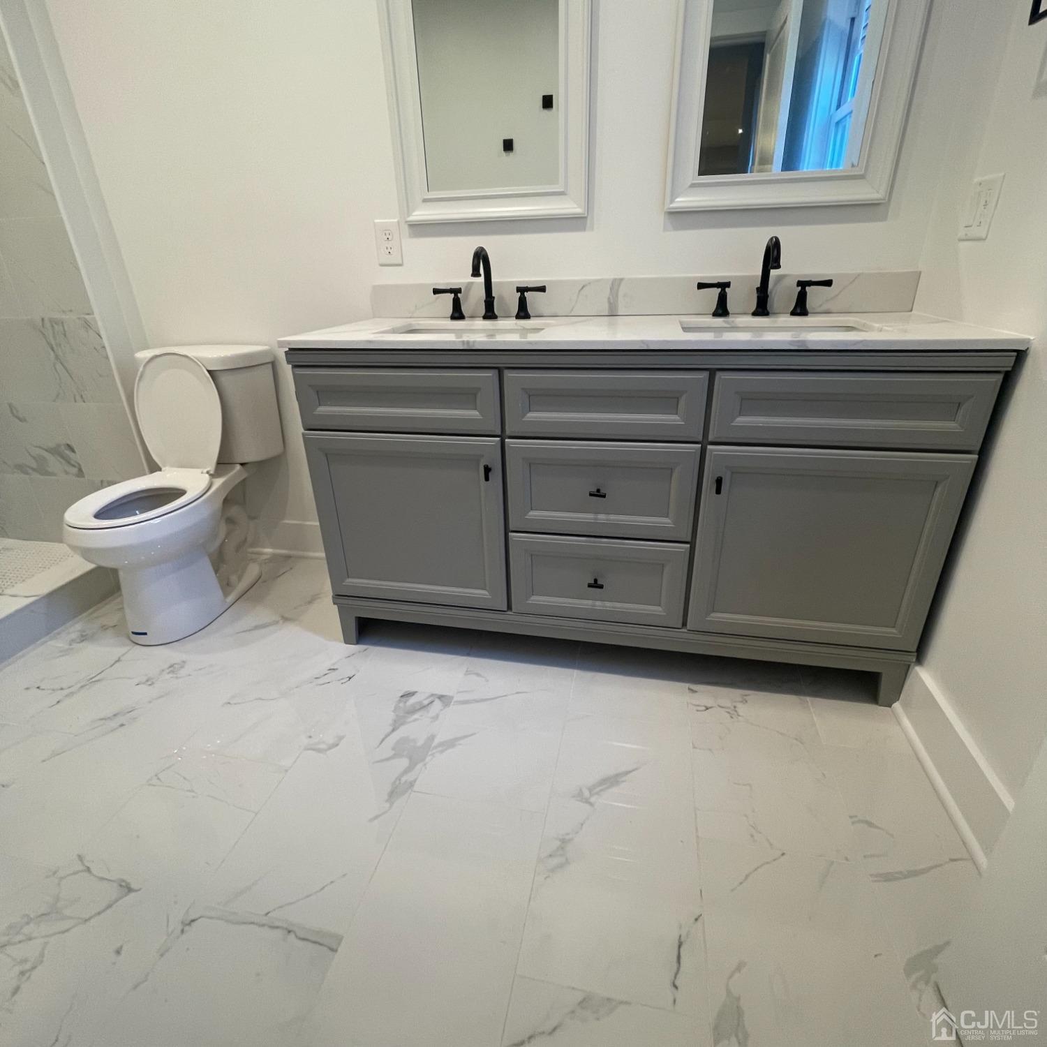 799 Highway 34 Matawan, NJ 07747 - Photo 11 of 11 a bathroom with a sink and a toilet