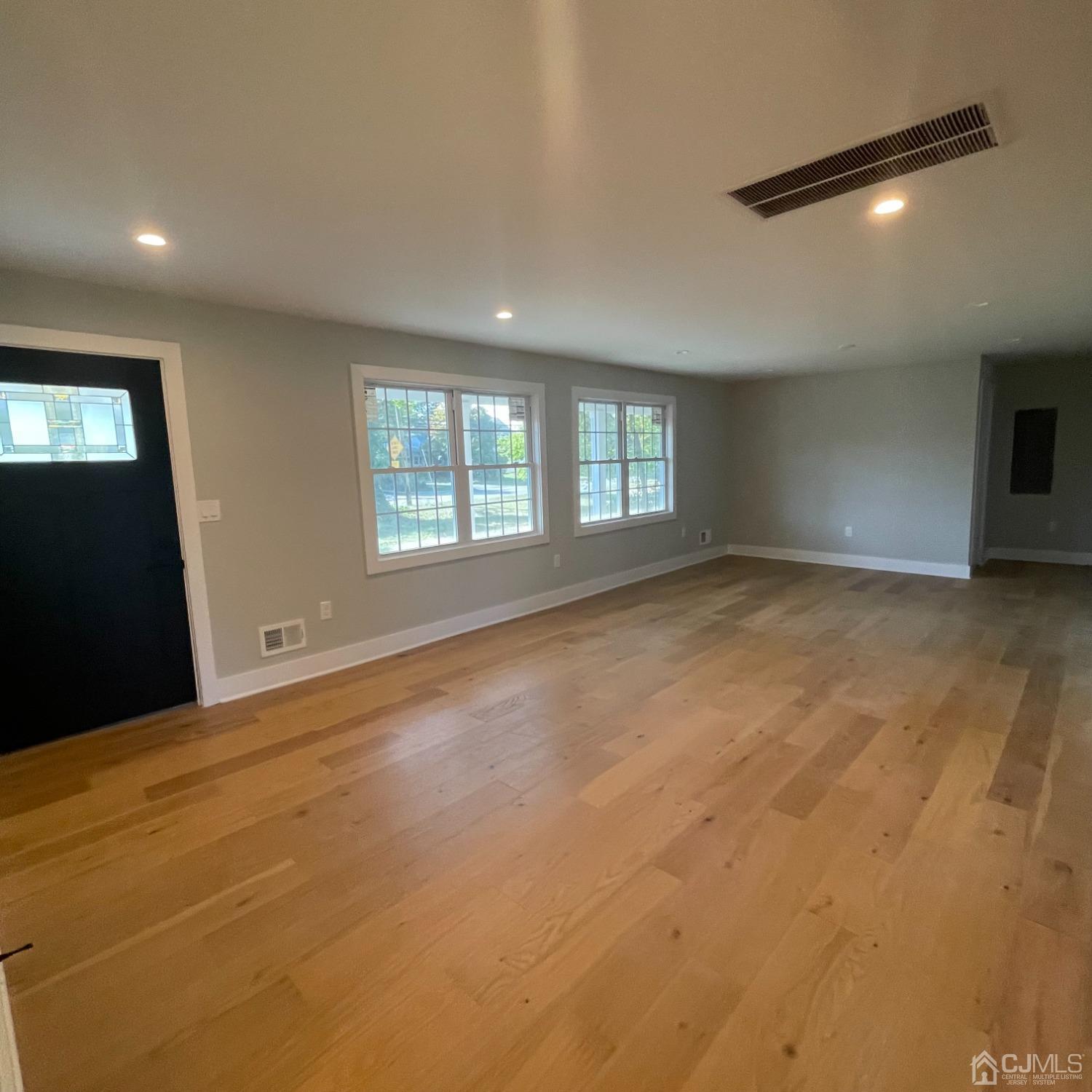 799 Highway 34 Matawan, NJ 07747 - Photo 4 of 11 an empty room with windows