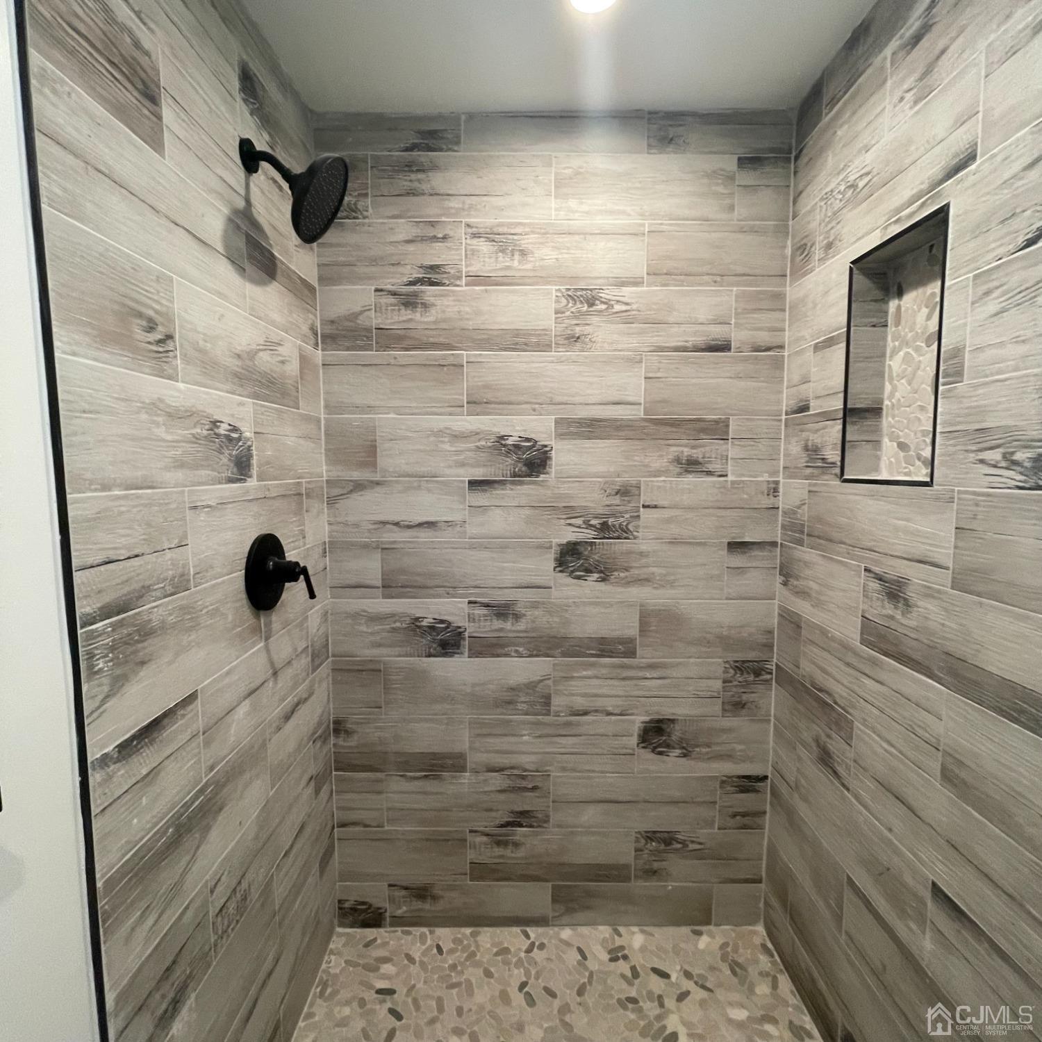 799 Highway 34 Matawan, NJ 07747 - Photo 7 of 11 a bathroom with a shower