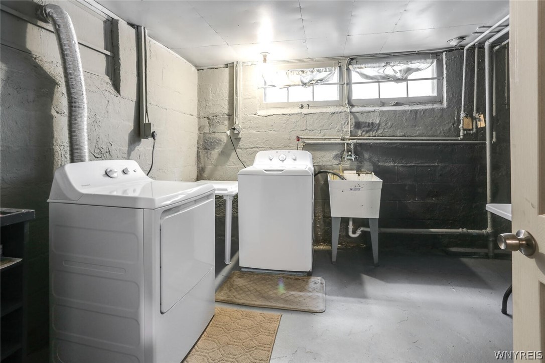 396 Highgate Avenue Buffalo, NY 14215 - Photo 11 of 27 Basement laundry