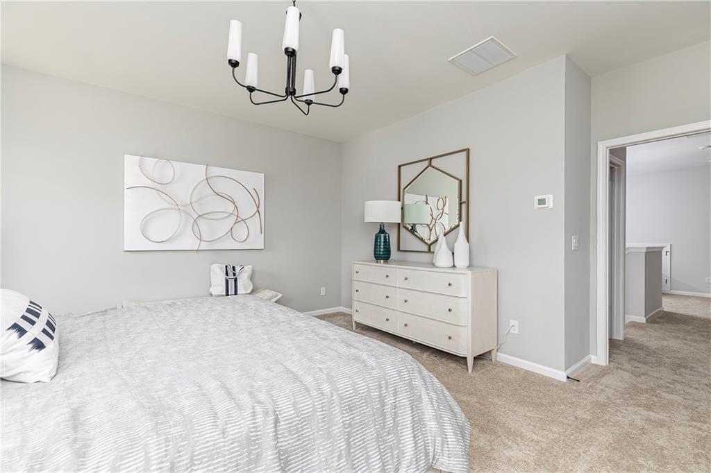 337 Brighton Bnd Lane Acworth, GA 30102 - Photo 29 of 83 a bedroom with a bed and a dresser